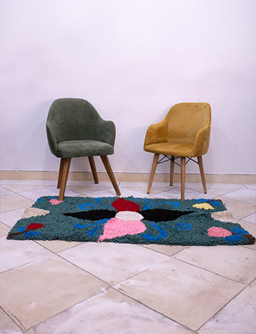 Dark Green Moroccan Rug with a Multi-color Flower at The Center
